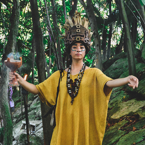 Mayan lady welcoming visitors